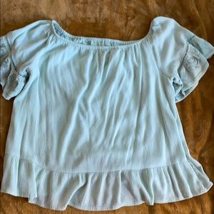 I am selling a Seafoam green blouse